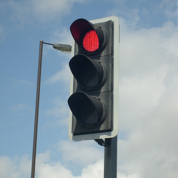 A stoplight lit red